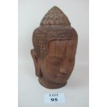 A 20c Cambodian carved wooden head est: