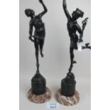 A large pair of bronze classical figures