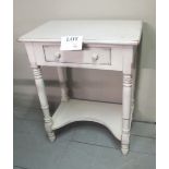 A white painted occasional table with si