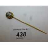 A cameo type stick pin est: £60-£80