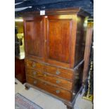 A George III mahogany linen press with c