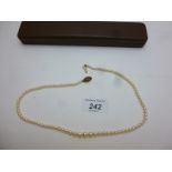 A graduated pearl necklace with 9ct gold