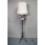 A 20c metal standard lamp and shade est: