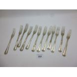 A set of twelve three pronged silver for