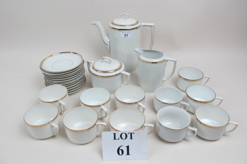 A 20c white china coffee set with extra