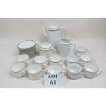 A 20c white china coffee set with extra