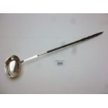 A whale bone toddy ladle est: £50-£70