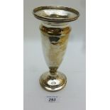 A silver tapering vase (approx 8" high)