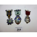 A collection of three silver and enamell
