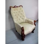 A Victorian carved walnut armchair uphol