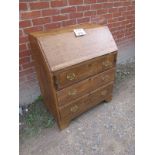 A 19c light oak and pine bureau with fit