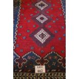 A 20c Persian rug with three central med