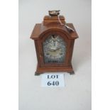 A 20c oak cased small bracket clock with