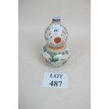 A Chinese gourd vase painted with childr