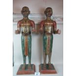 A large pair of magnificent Indian carved figures painted and gilded possibly early 20c (132 cm