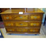 A fine continental oak chest of three lo