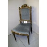 A gilt painted French style chair with b