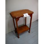 A 20c oak side table with lower shelf in