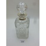 A square cut glass decanter and stopper