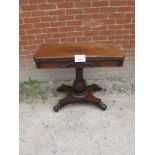 A Victorian rosewood turnover card table