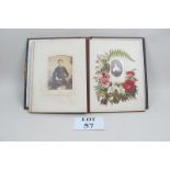 A Victorian photograph album with leathe