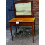 An Edwardian mahogany dressing table wit