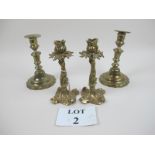 Two pairs of brass candlesticks est: £30-£50 (A2)