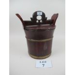 An early 20c Chinese rice container with locking lid (31 cm high) est: £25-£40 (A2)