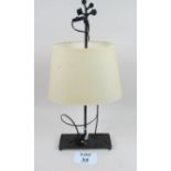 A decorative bronze based table lamp and shade est: £25-£45 (G1)