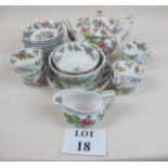 Twenty four pieces of 19c china to include tea pot, saucers, cups,