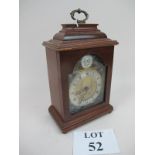 A 20c walnut cased bracket clock with brass and silvered dial (English) est: £60-£80 (G2)