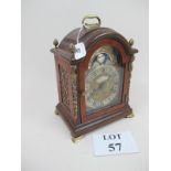 A walnut cased clock with brass mounts silver and brass moon dial signed Thomas Smith London est: