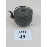 A 19c Chinese pewter teapot est: £40-£60 (N3)