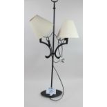 A decorative bronze based table lamp and shade est: £30-£50 (G1)