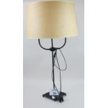 A decorative bronze based table lamp and shade est: £30-£50 (G1)