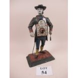 A 20c metal clock figure man holding clock & weighs est: £80-£120 (G1)