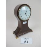 A 20c mahogany balloon clock with box wood stringing the dial signed Comitti,