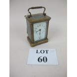 A late 19c brass carriage clock with enamel dial (a/f) est: £30-£50 (G2)