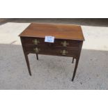 An Edwardian mahogany lowboy with two short over one long drawer and tapering legs est: £60-£90