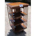 A large Edwardian mahogany freestanding revolving bookcase (slightly a/f top) est: £100-£150