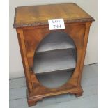 A 20c pale mahogany music cabinet on bracket feet est: £50-£80