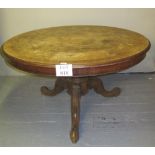 A Victorian inlaid round tilt top dining/breakfast table on central carved column and terminating