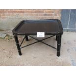 A Chinese black lacquered tray top table terminating on bamboo effect legs est: £150-£250