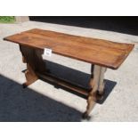 A rustic oak refectory table of slim proportions 6-8 seater maximum est: £100-£200