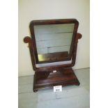 A Victorian mahogany toilet mirror on a pedestal base in clean condition est: £50-£80