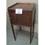 An Edwardian mahogany bedside table with gallery rail to top and terminating on tapered legs est: