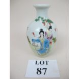 A Chinese vase painted with ladies in a