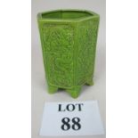 A Chinese green brush pot decorated with