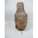 A mid 20c Cambodian carved figure head (