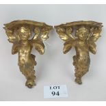 A pair of 19c gilt cherub wall brackets